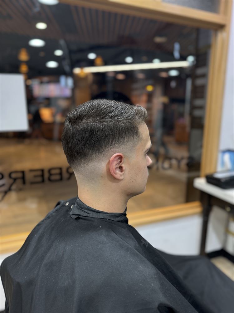 Short crop with a low taper fade